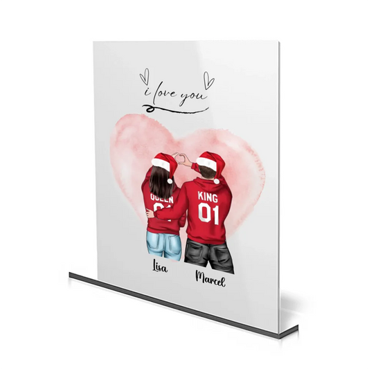 Personalisiertes Acrylglas mit Weihnachtsmotiv von einem Paar mit Weihnachtsmütze